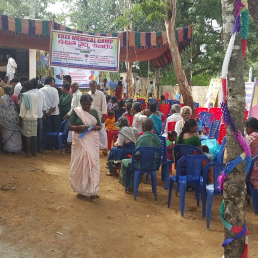 The villagers waiting for the opening ceremony