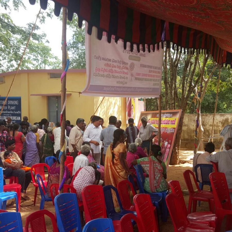 The villagers waiting for the opening ceremony