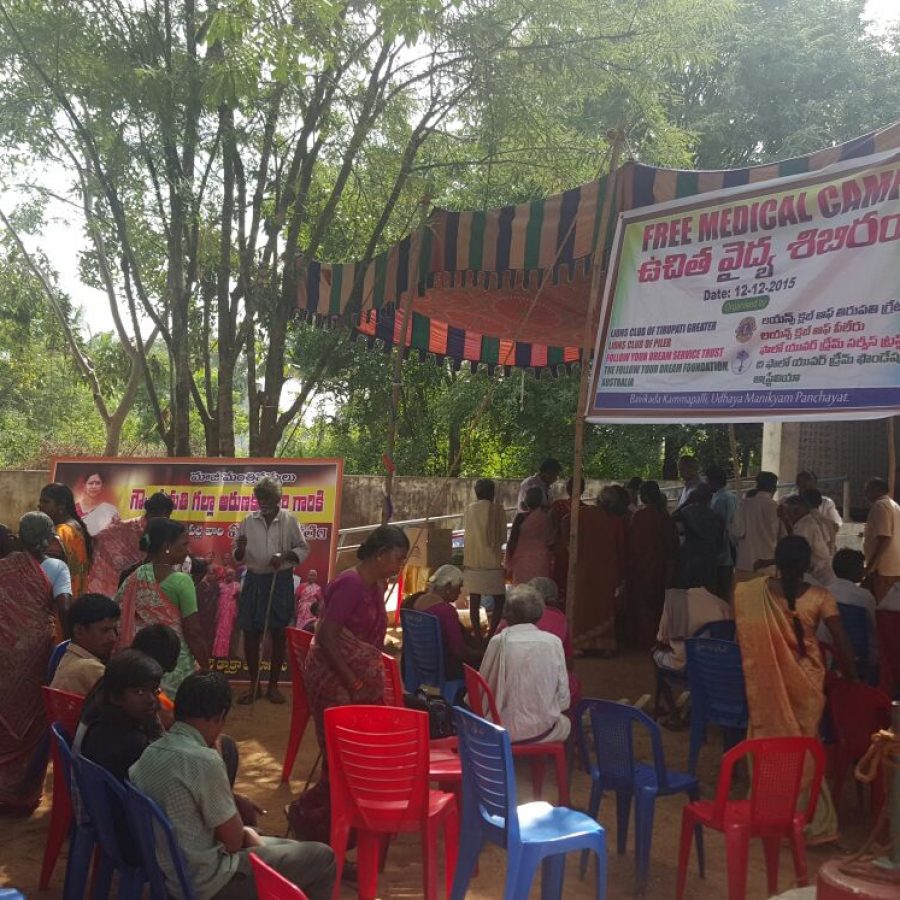 The villagers waiting for the opening ceremony