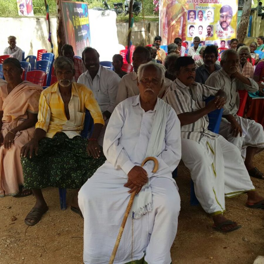 The villagers waiting for the opening ceremony