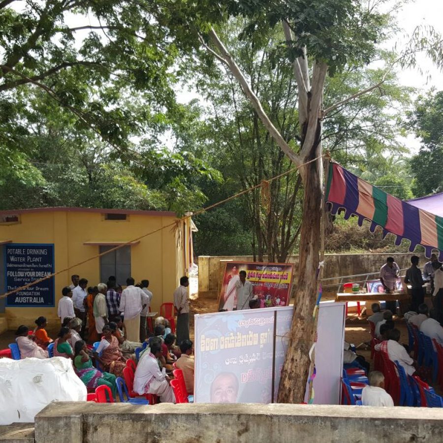 The villagers waiting for the opening ceremony
