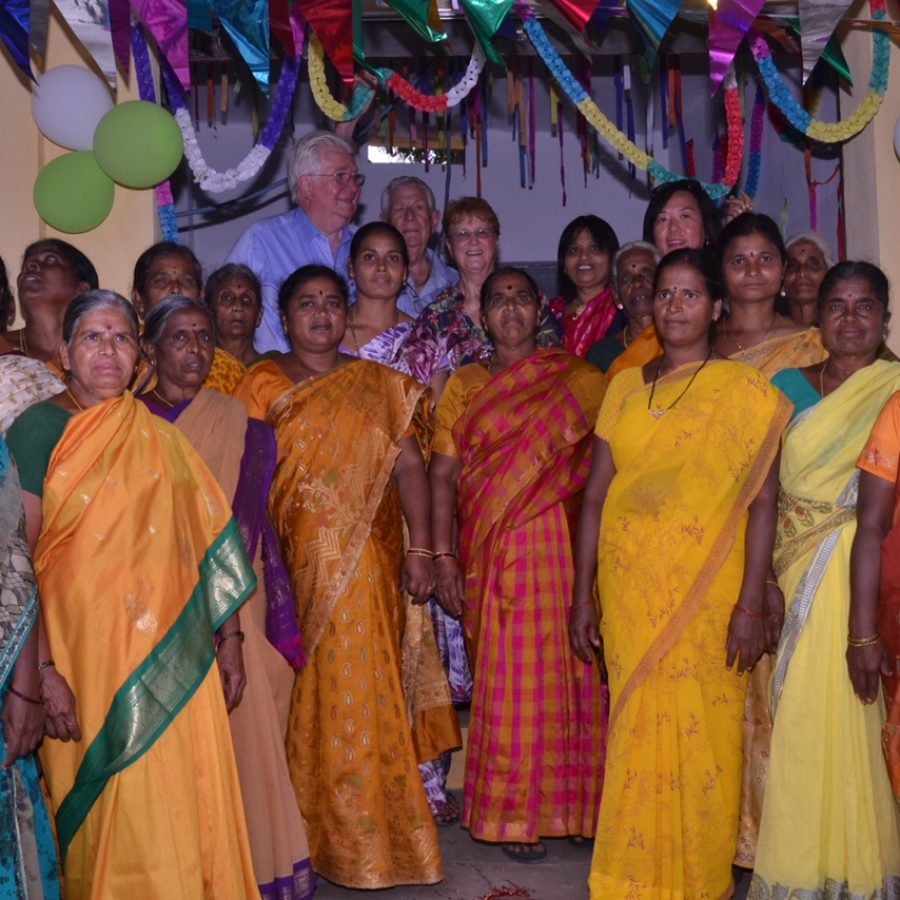 The villagers waiting for the opening ceremony